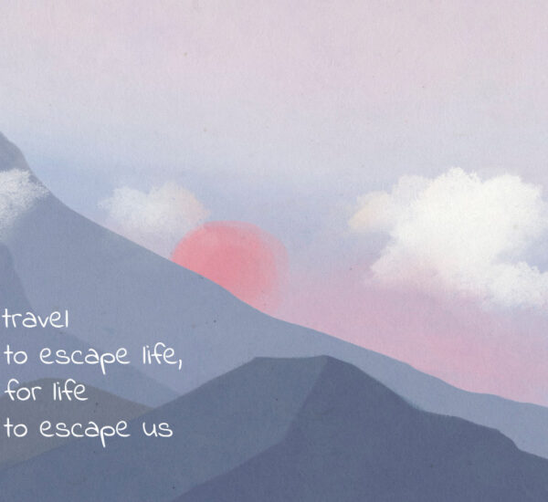 a mountain range with a pink sun